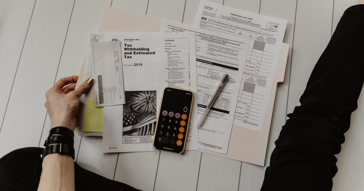 Common bailiff myths debunked - calculator and financial documents