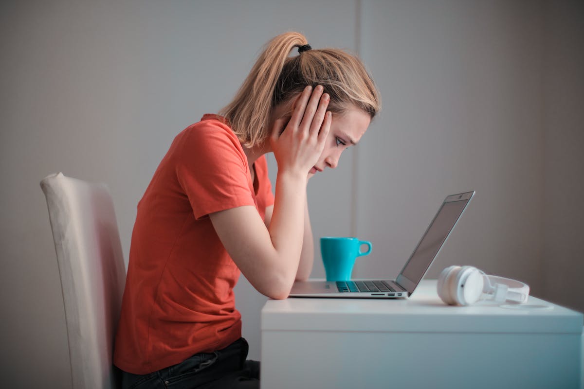 Person stressed about bedroom tax and council tax arrears
