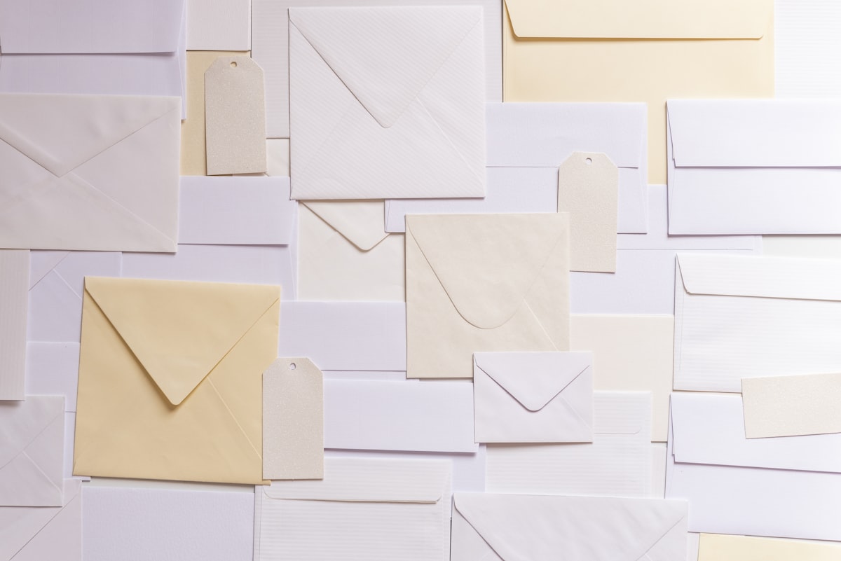 Pile of unopened envelopes representing ignored council tax debt letters